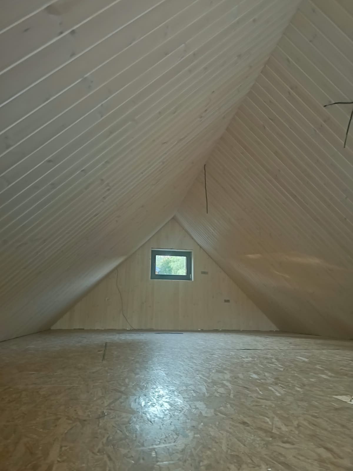 Ansicht des Dachgeschosses mit Holzverkleidung
